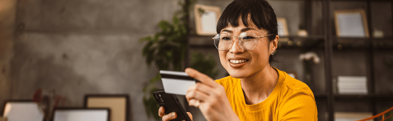 woman making a purchase on a phone